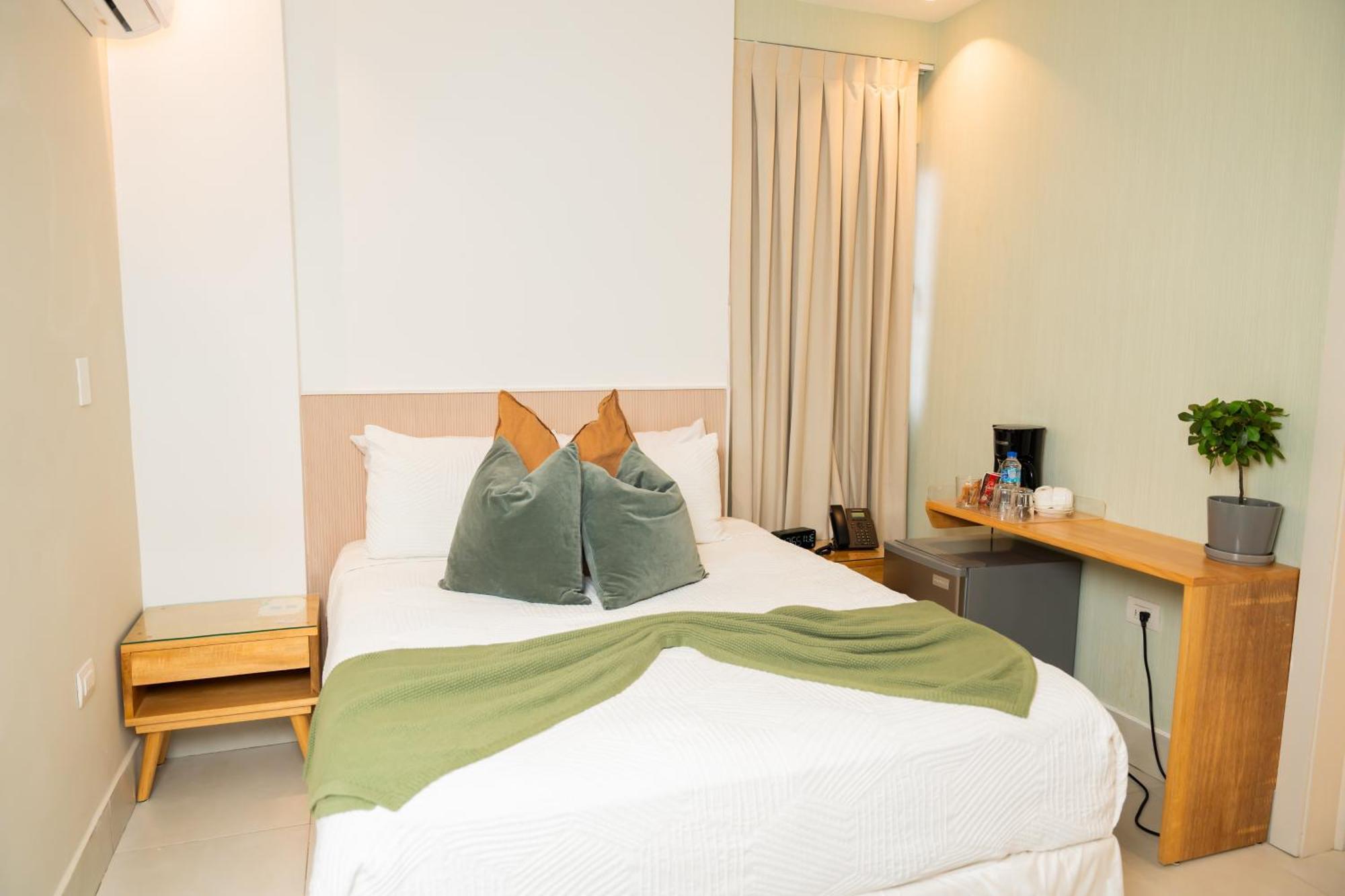 Hotel Stay Here Suites Santo Domingo Buitenkant foto